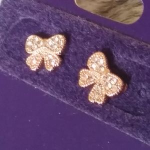 Claire's rose gold plated bow earrings